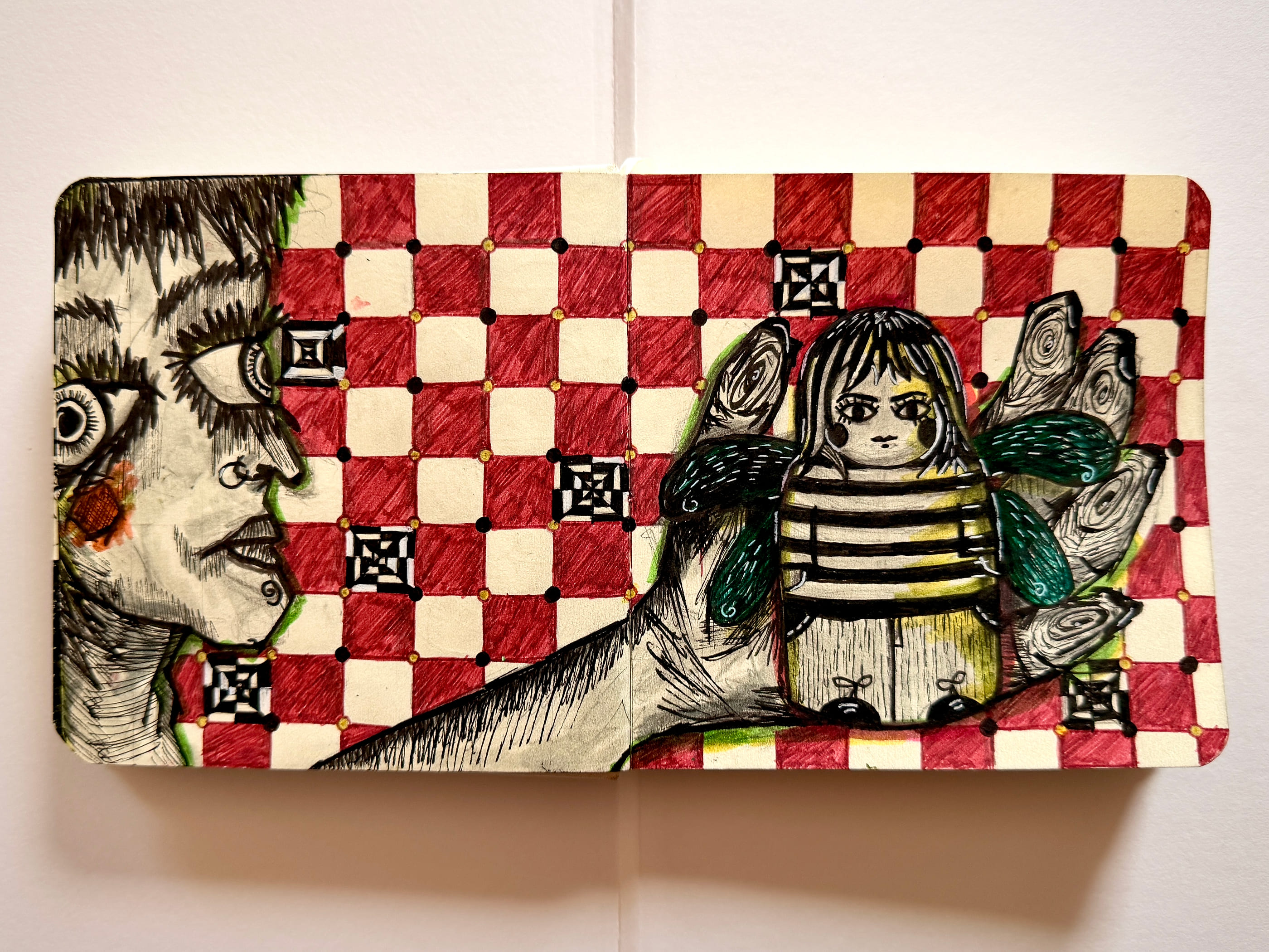 A sharp-featured face in profile, built from heavy ink hatching, stares across a red and cream checkerboard at a small doll-like figure with green wings and a striped body, held up by disembodied wooden hands.